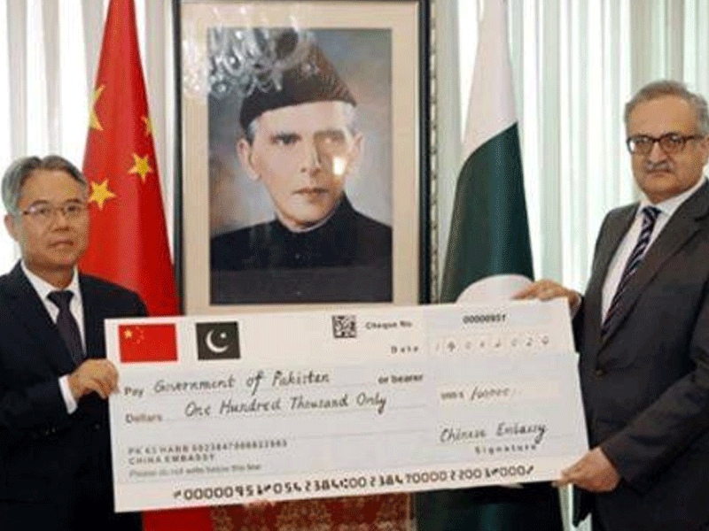 China hands over $100,000 cash assistance for rain-hit areas in Balochistan, KP