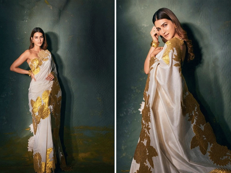 Kriti Sanon left her fans bedazzled in ivory, golden saree