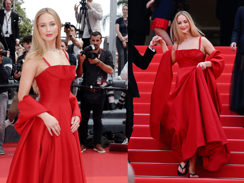 Jennifer Lawrence ditches heels with red gown