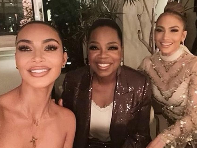 Kim Kardashian seems tensed as poses with Jennifer, Oprah