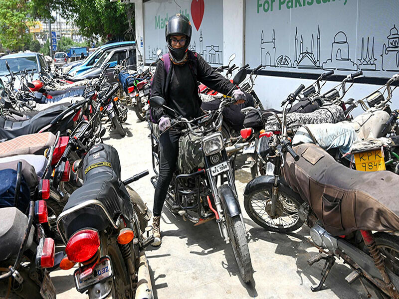 Women ride Pakistan’s economic crisis into workplace