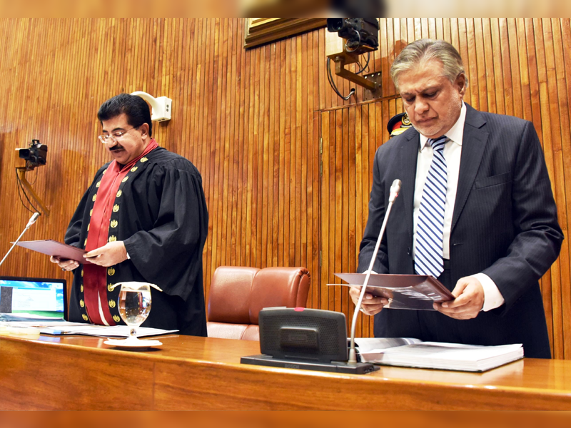 Dar sworn in as Senator amid PTI’s uproar in Upper House