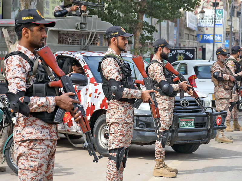 Rangers conduct extensive flag march across Karachi ahead of election