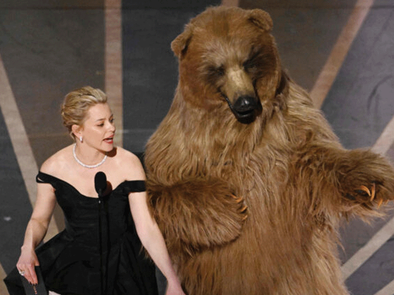 2023 Oscar: Elizabeth strips on stage, jokingly blames ‘Cocaine Bear’