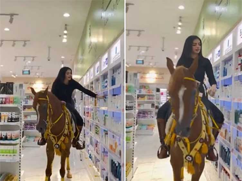 Saudi woman shops on horseback to promote horse riding