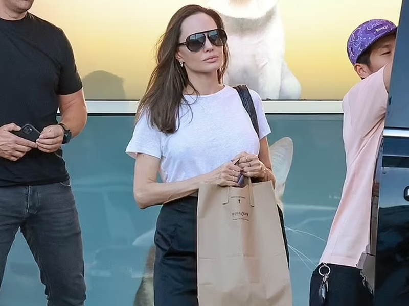 Angelina Jolie looks like an angel as steps out in white T-shirt, flared silky slacks